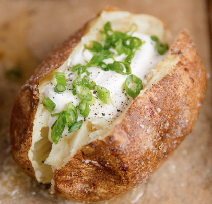 Baked Potato with Butter & Sour Cream at Texas Roadhouse (gluten‑free)